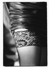 Tight Shot of Girl's Leg Showing Stocking Top