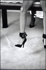 Girl's Legs with Leather Anklets and High Heels