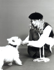 Girl Kneeling with White Fluffly Dog