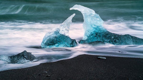 Glacier Ice Swept On Shore